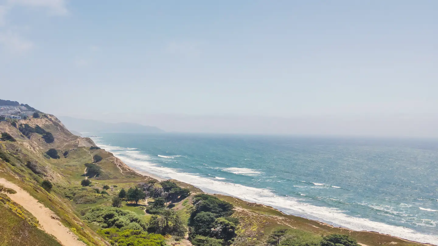 The bluff-top trail above the beach and the Pacific
